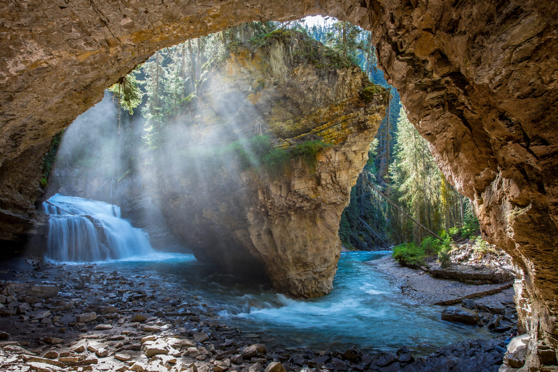 View of Johnston Canyon's caves waterfall and river. 